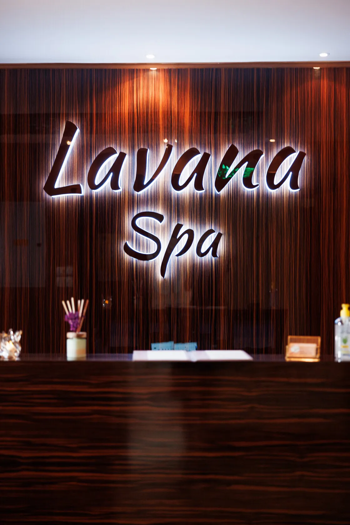 Lit Lavana Spa sign above the reception desk at the Bur Dubai branch