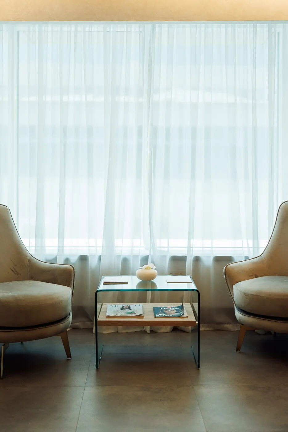 Seating by the window in the relaxation area at Lavana Spa DIFC