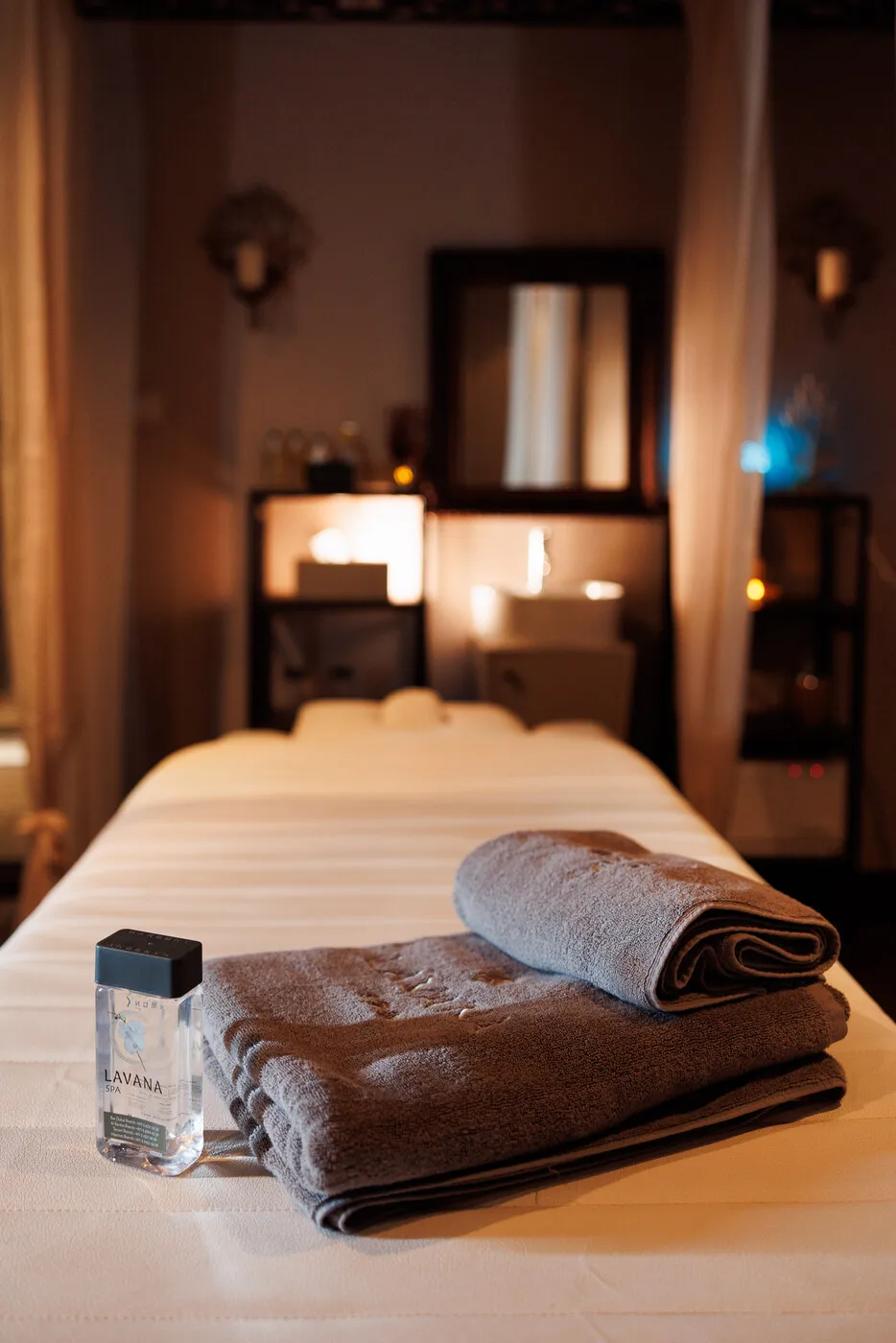 Massage room at Lavana Spa Bur Dubai, lit by candles