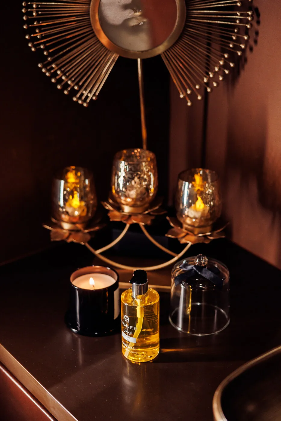 Candles and massage oil on the console at the Al Barsha branch